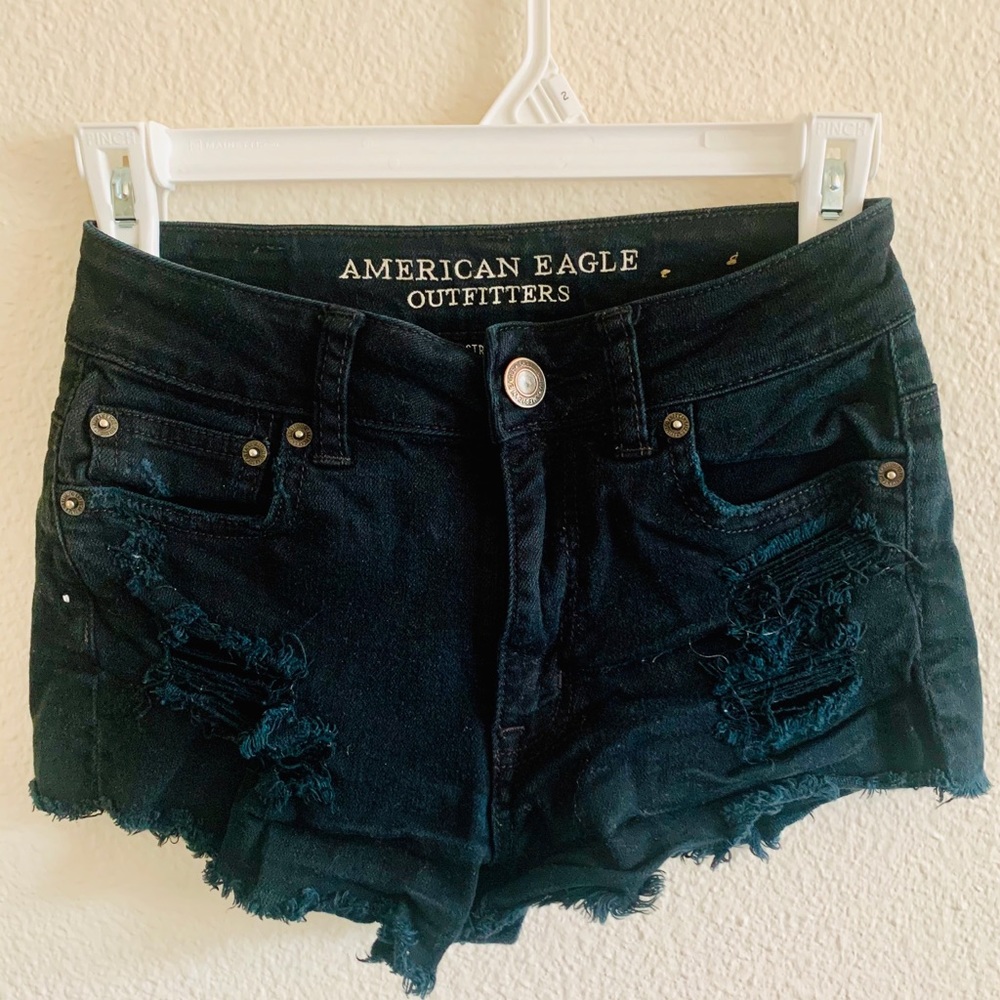 Black distressed jean shorts